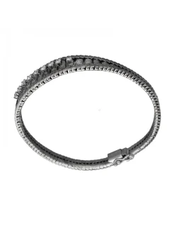Pulsera de Oro blanco con diseño semirrígido y nueve Brillantes