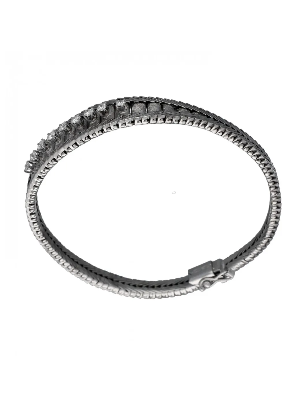 Pulsera de Oro blanco con diseño semirrígido y nueve Brillantes