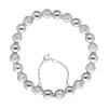 Pulsera Reviere de oro blanco 18K con diseño y brillantes