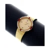 Reloj de Oro amarillo con diseño OMEGA, Brillantes y Rubíes